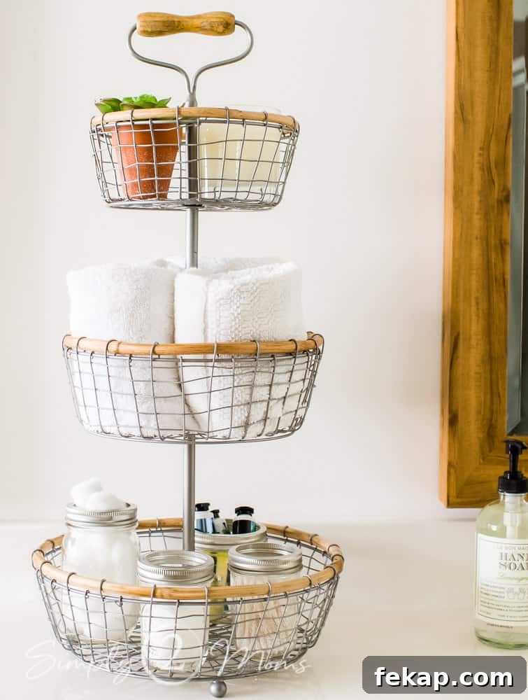 3 tiered stand filled with tolietries and towels