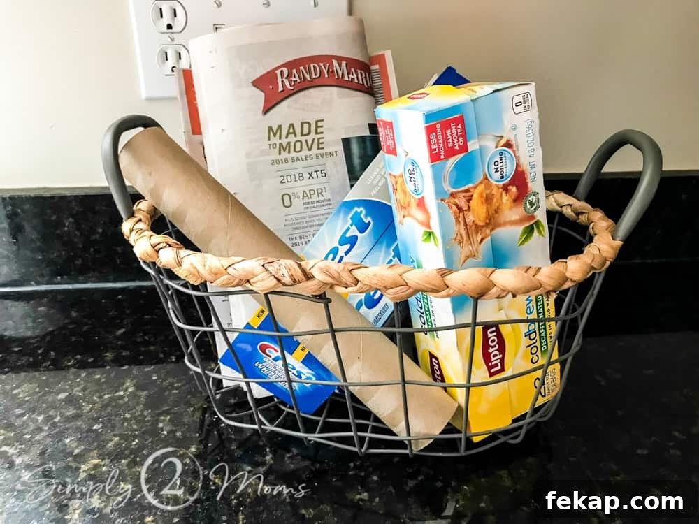 wire basket filled with cardboard and paper recycling