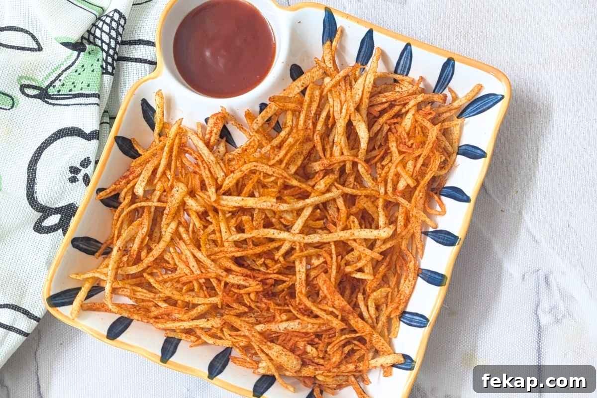 Air Fryer Potato Recipes for Crispy Golden Potatoes 4 Shoestring fries on a plate