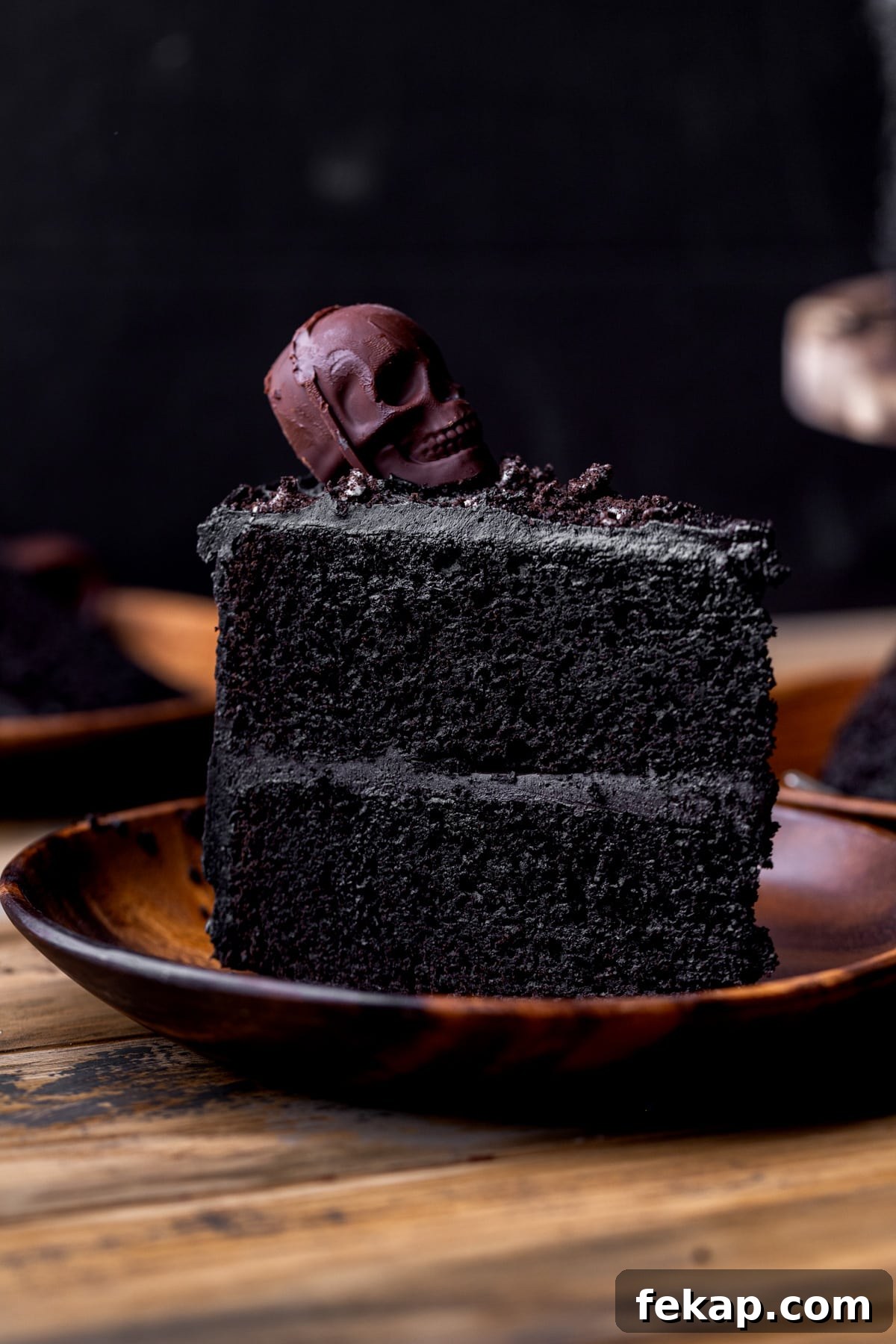 Spooky Halloween Chocolate Cake Recipe 11 One slice of cake on a plate.