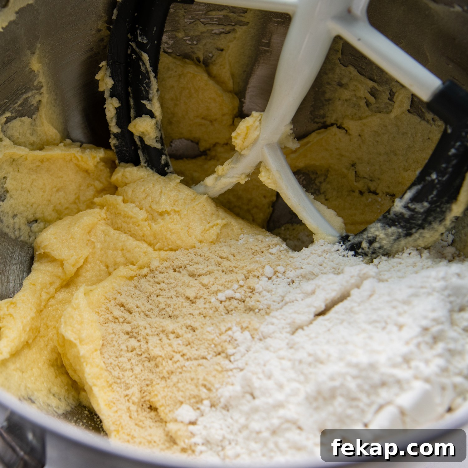 adding the gluten free flour and almond flour to the dough.