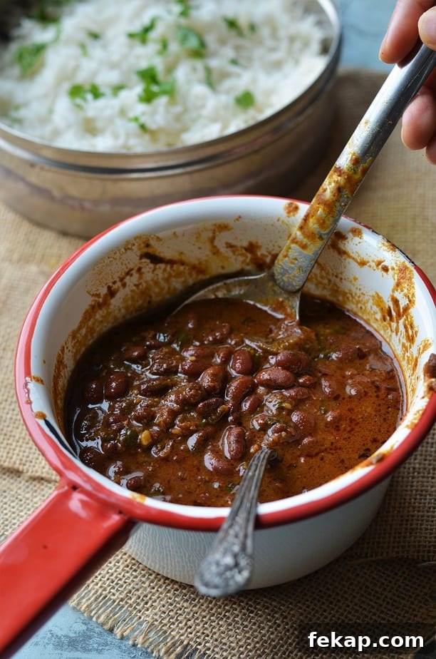 Instant Pot Rajma chawal recipe served in a red handled saucepan