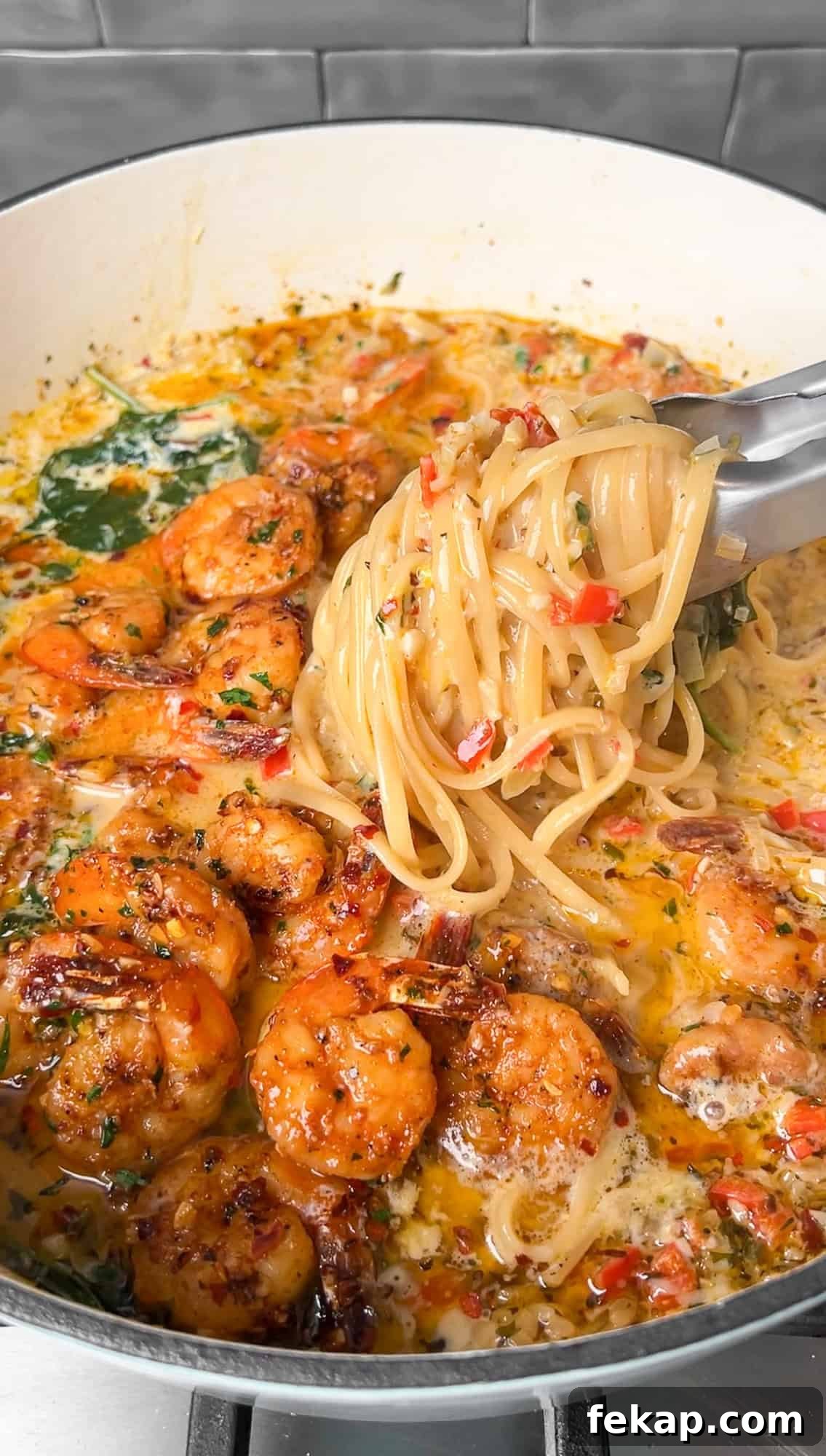 One-Pot Garlic Butter Shrimp Scampi with Lemon 2 shrimp and linguine in a pot for shrimp scampi