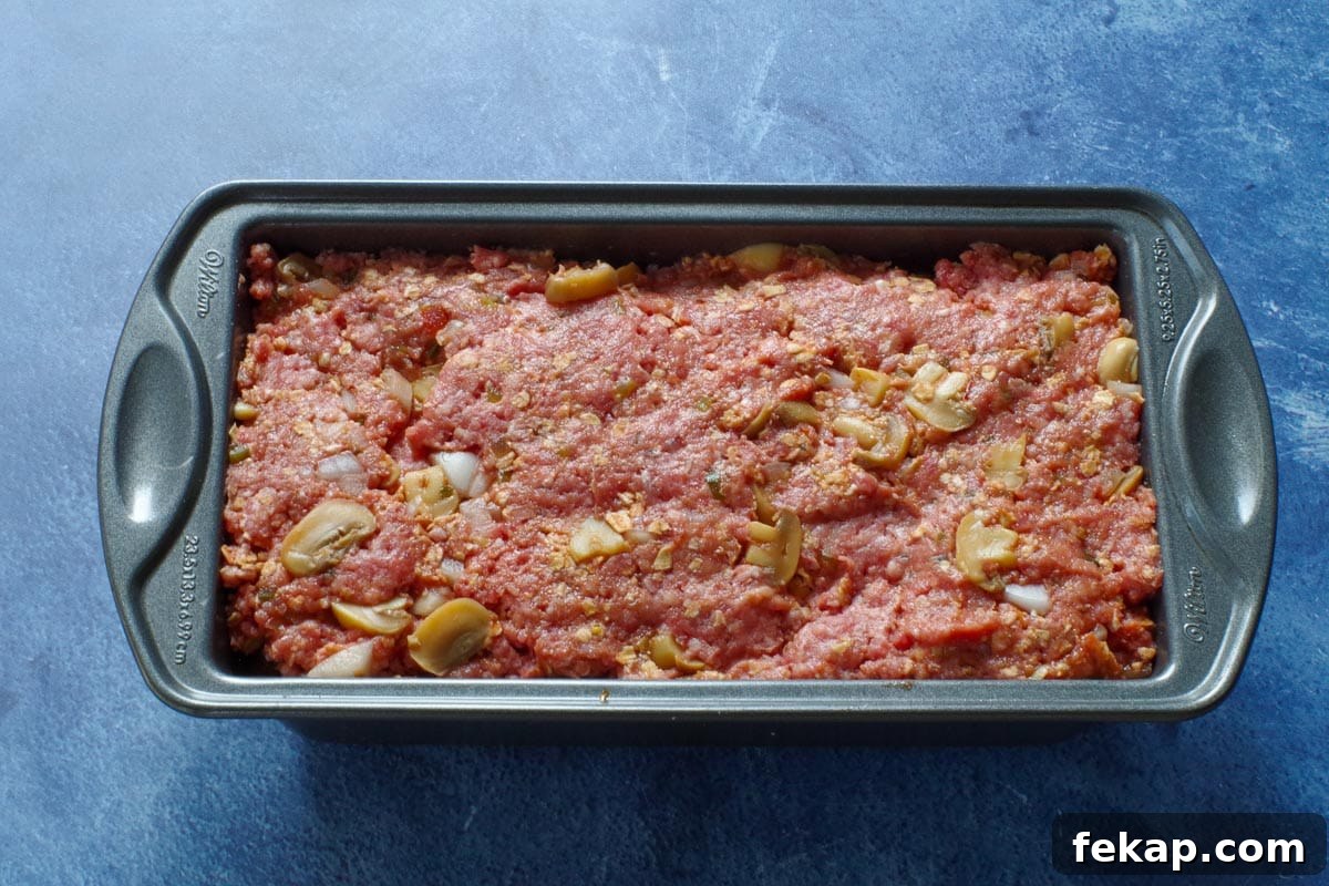 Old-Fashioned Gluten-Free, Dairy-Free Meatloaf (No Eggs or Milk) 7 meatloaf mixture pressed into a loaf pan