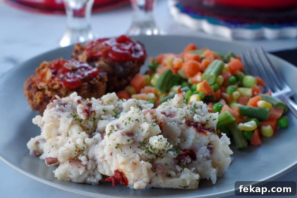 Old-Fashioned Gluten-Free, Dairy-Free Meatloaf (No Eggs or Milk) 8 chipotle mashed potatoes on a plate with vegetables and meatloaf