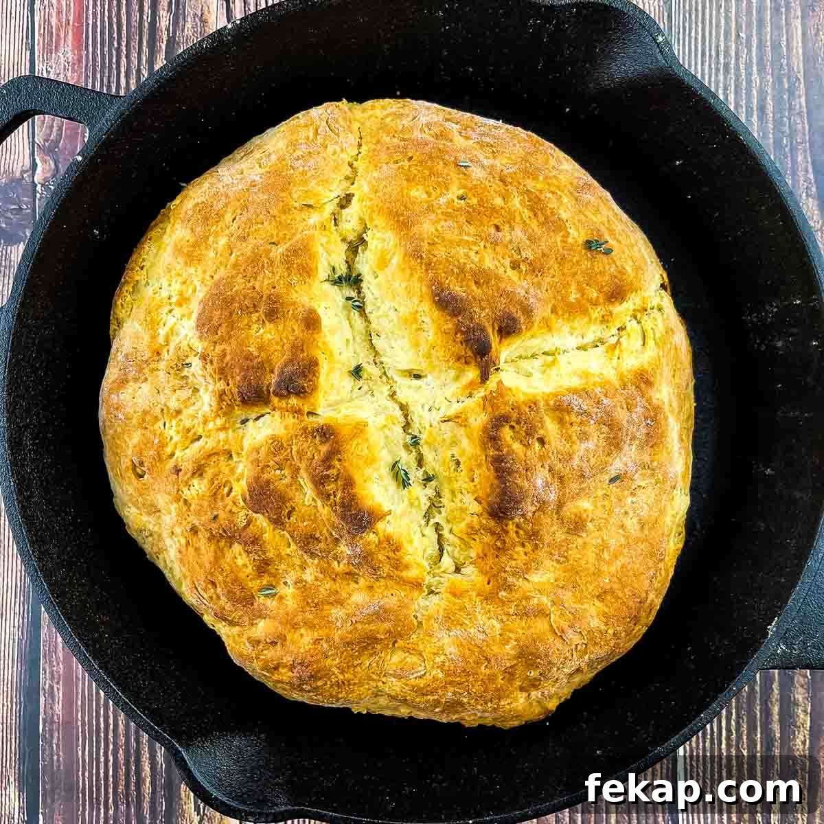 How to Make Irish Soda Bread Without Buttermilk 5 The baked soda bread in a cast iron skillet.