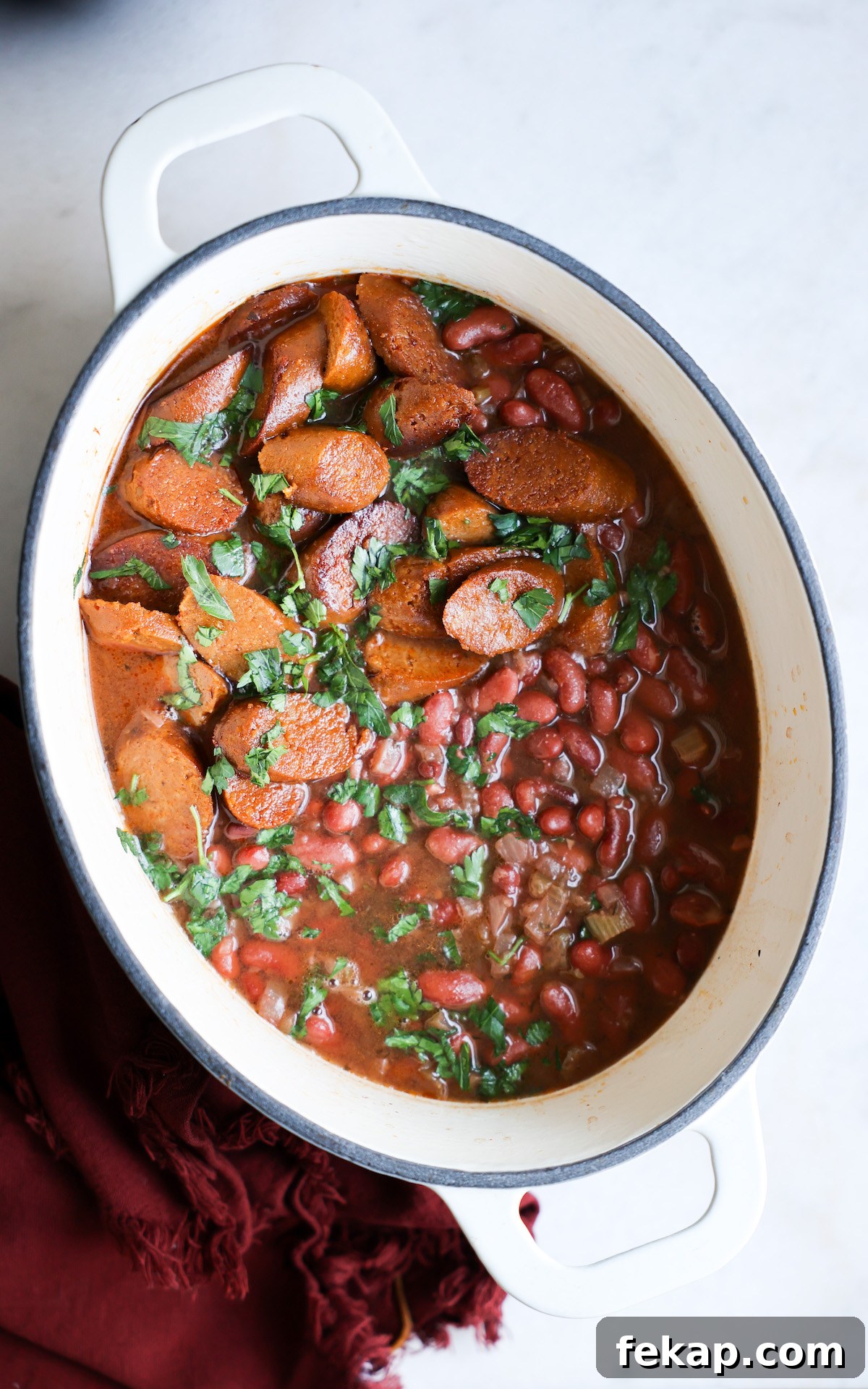 cooked red beans in a white dutch oven pot
