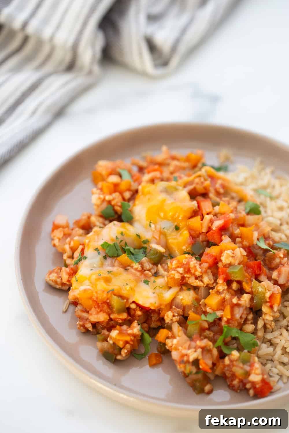 One Pan Stuffed Pepper Skillet Recipe 3 Low carb stuffed pepper skillet with ground chicken, bell peppers, tomato sauce, and melted cheese.