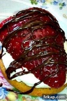 Soft and Chewy Strawberry Cream Cheese Cookies Recipe 4 a Strawberry Cookie Tart on a plate.