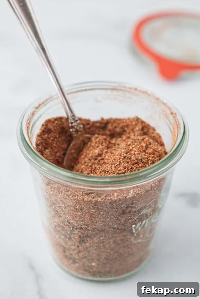 A jar of cajun seasoning mix.