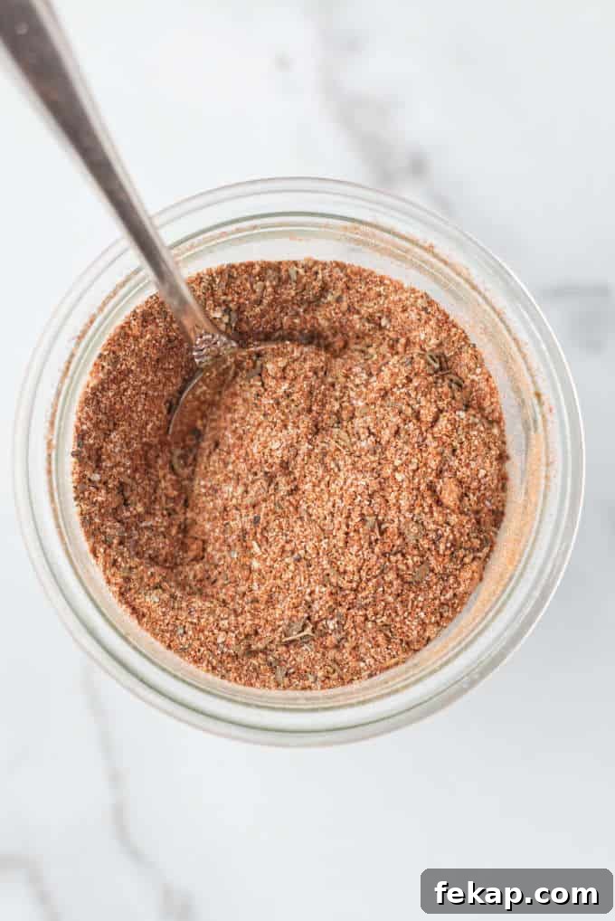 A jar of cajun seasoning mix.