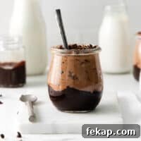 Chocolate cheesecake mousse in a glass cup.
