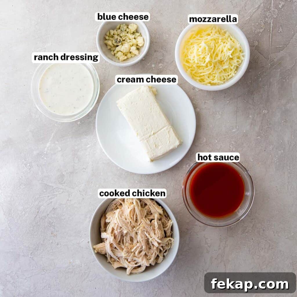 The ingredients for Buffalo Chicken Dip with overlay text.