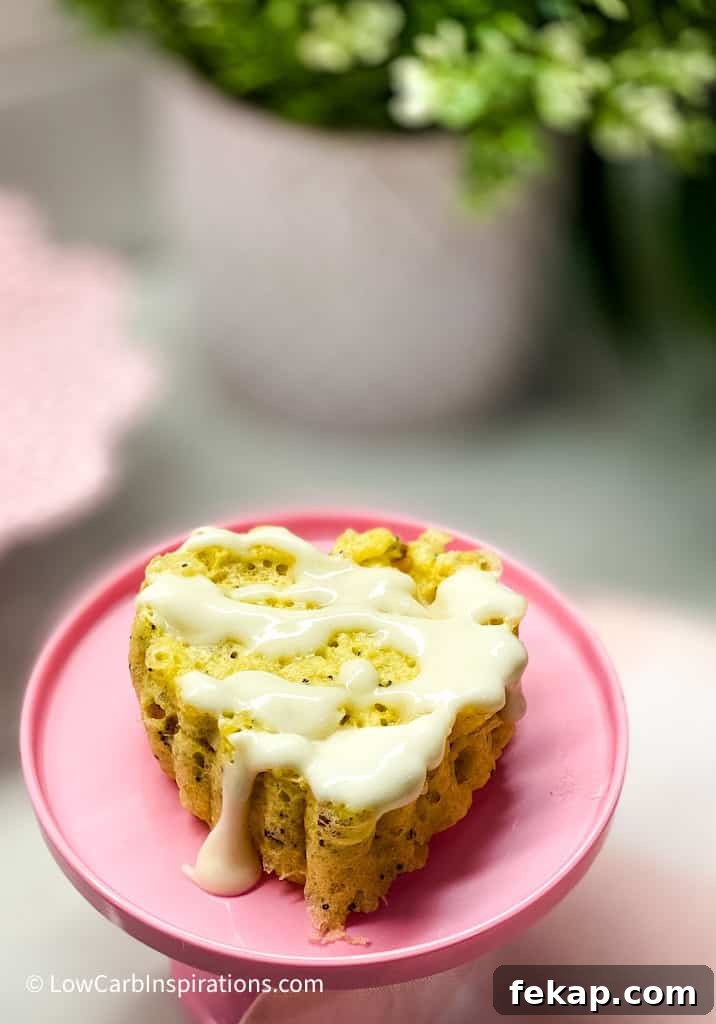 Close up of yellow cake on pink cake stand