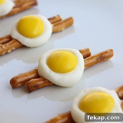 Green Eggs and Ham Pretzels Recipe for St. Patrick's Day 7 pretzels, white chocolate, and M&Ms