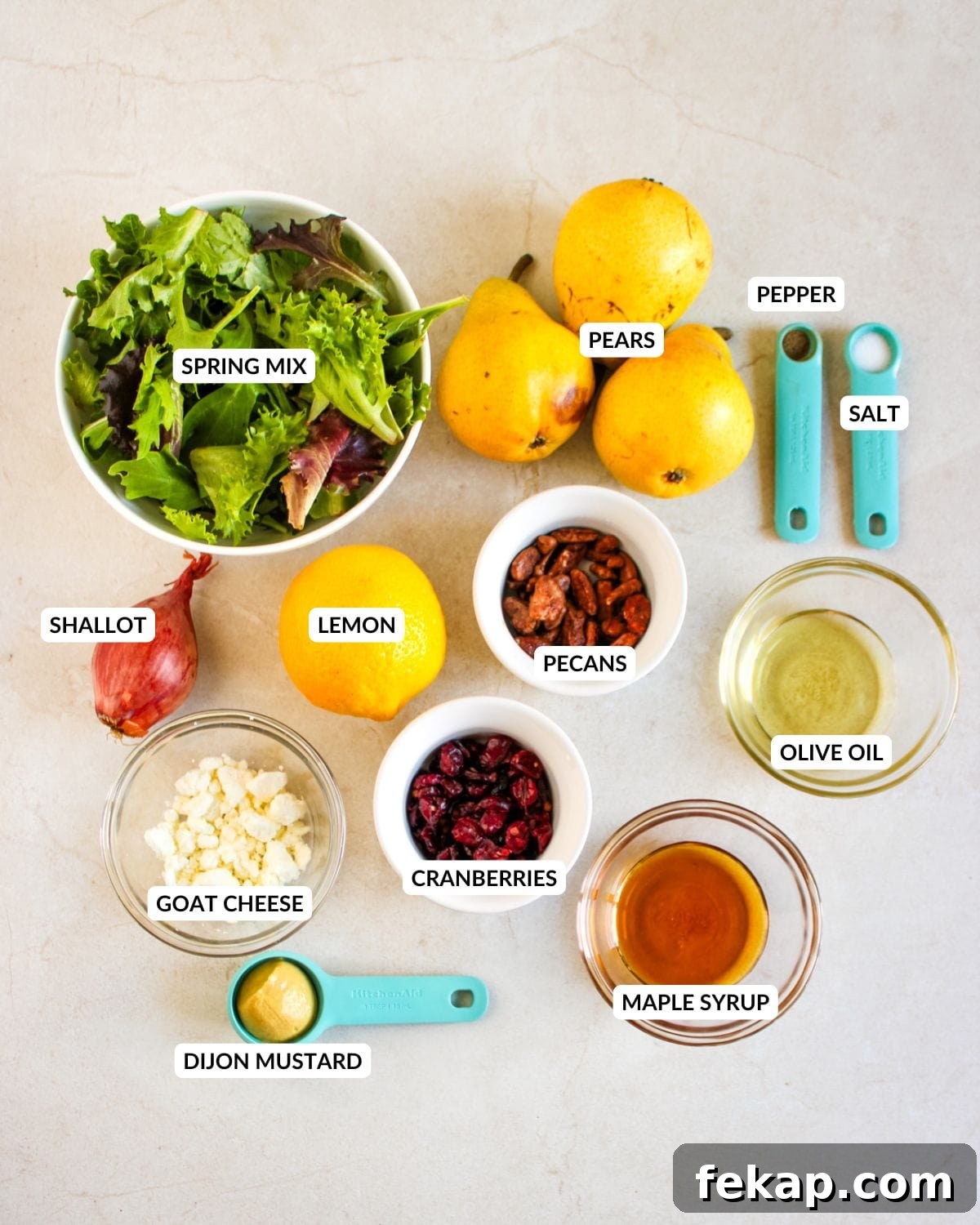 Roasted Pear Salad with Goat Cheese and Walnuts 3 An overhead image of the ingredients of roasted pear salad.