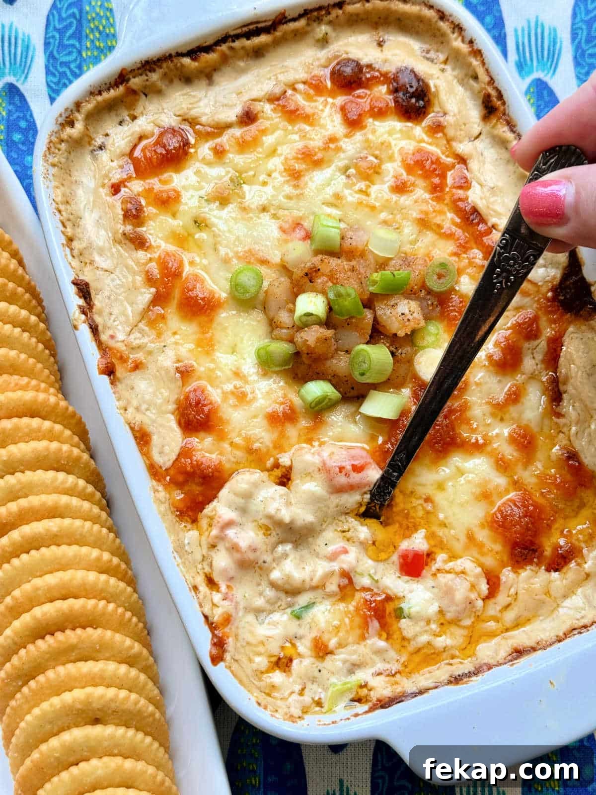Cajun Shrimp Dip Recipe: Creamy Party Appetizer 2 dish of cajun shrimp dip with a dish of Ritz crackers