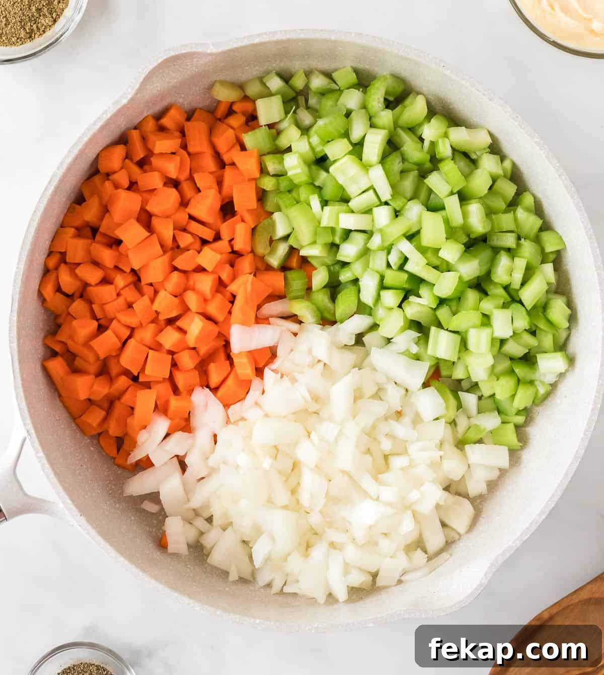 carrots, celery, and onion in a skillet