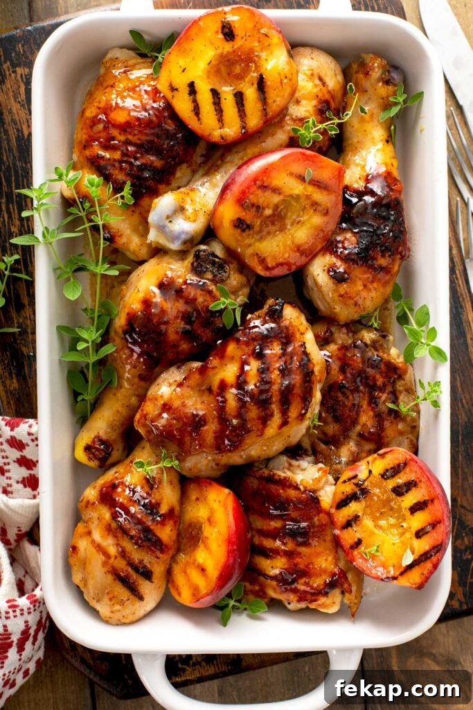 Grilled Chicken with Sticky Peach Glaze 2 White Ceramic container filled with peach glazed grilled chicken