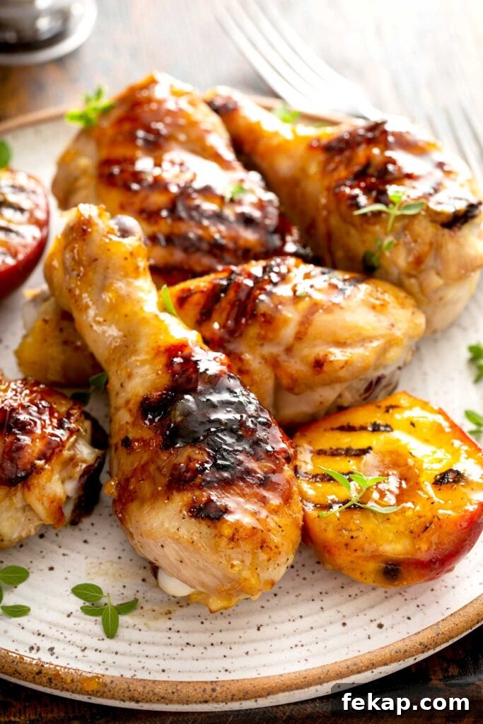 Grilled Chicken with Sticky Peach Glaze 3 Plate with grilled chicken pieces smothered in peach glaze