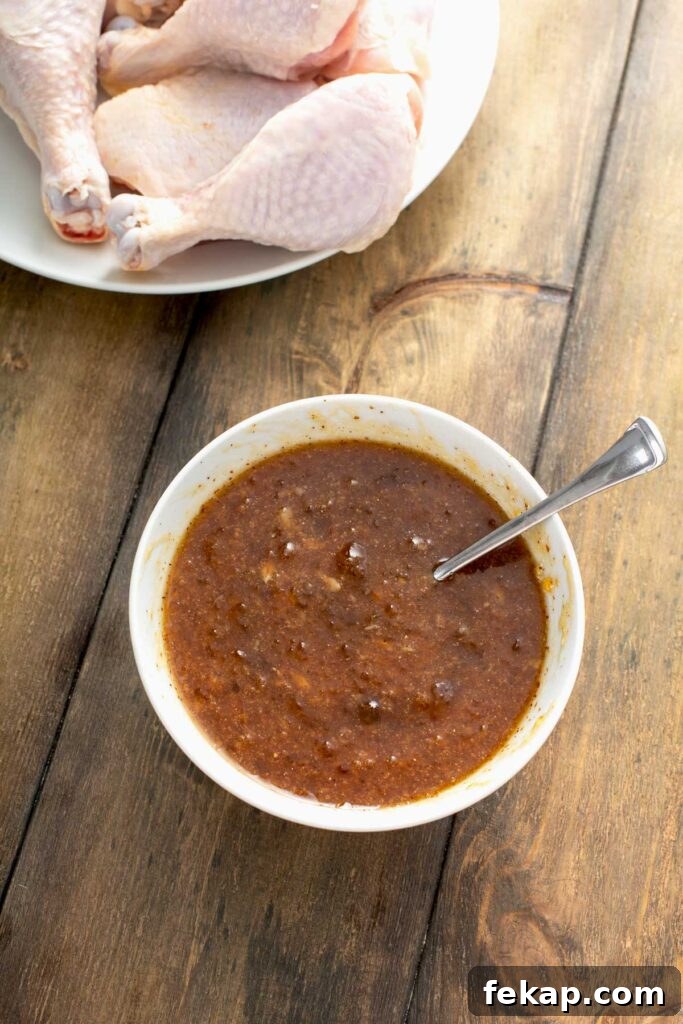 Grilled Chicken with Sticky Peach Glaze 7 peach glaze in a small white bowl