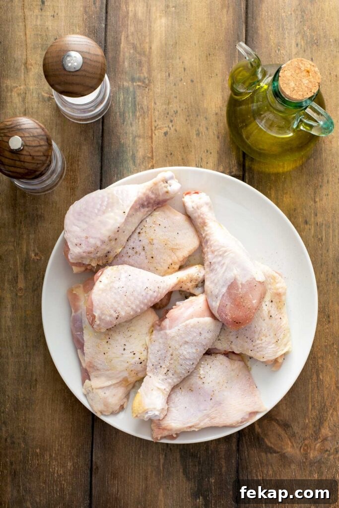 Grilled Chicken with Sticky Peach Glaze 8 top view of seasoned chicken in a white plate