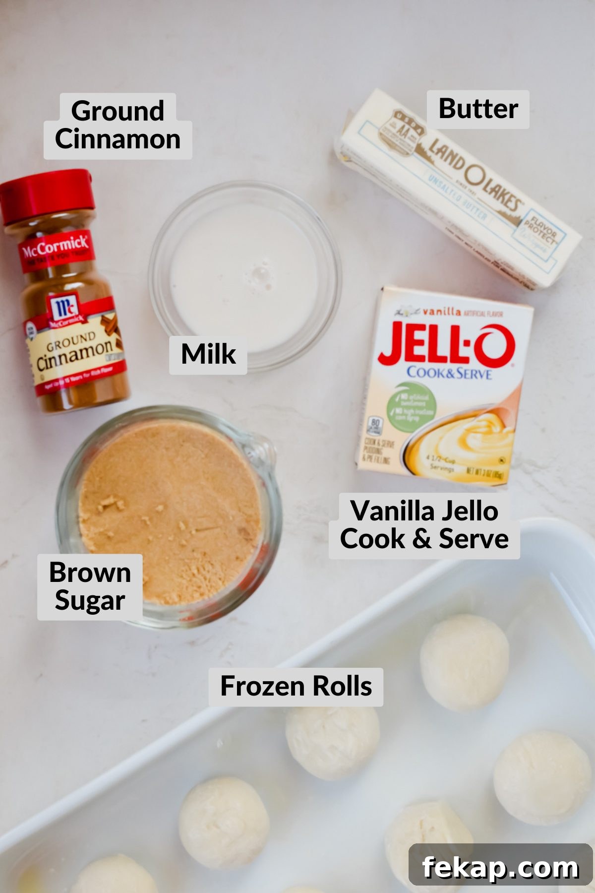 Classic Sticky Buns with Caramel Glaze 3 ingredients for old fashioned sticky buns spread on white background.