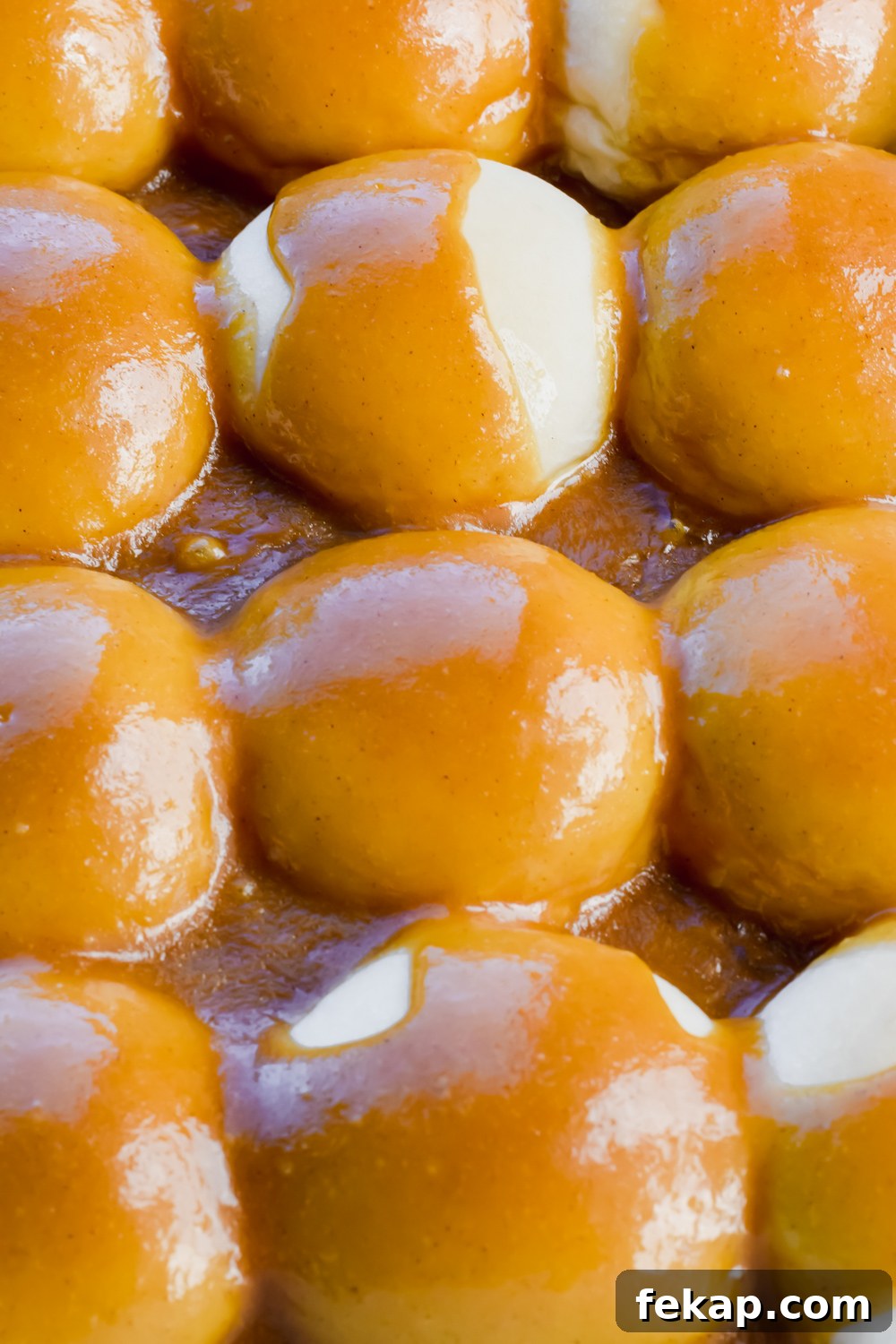 Classic Sticky Buns with Caramel Glaze 7 unbaked old fashioned sticky buns smothered in caramel sauce.