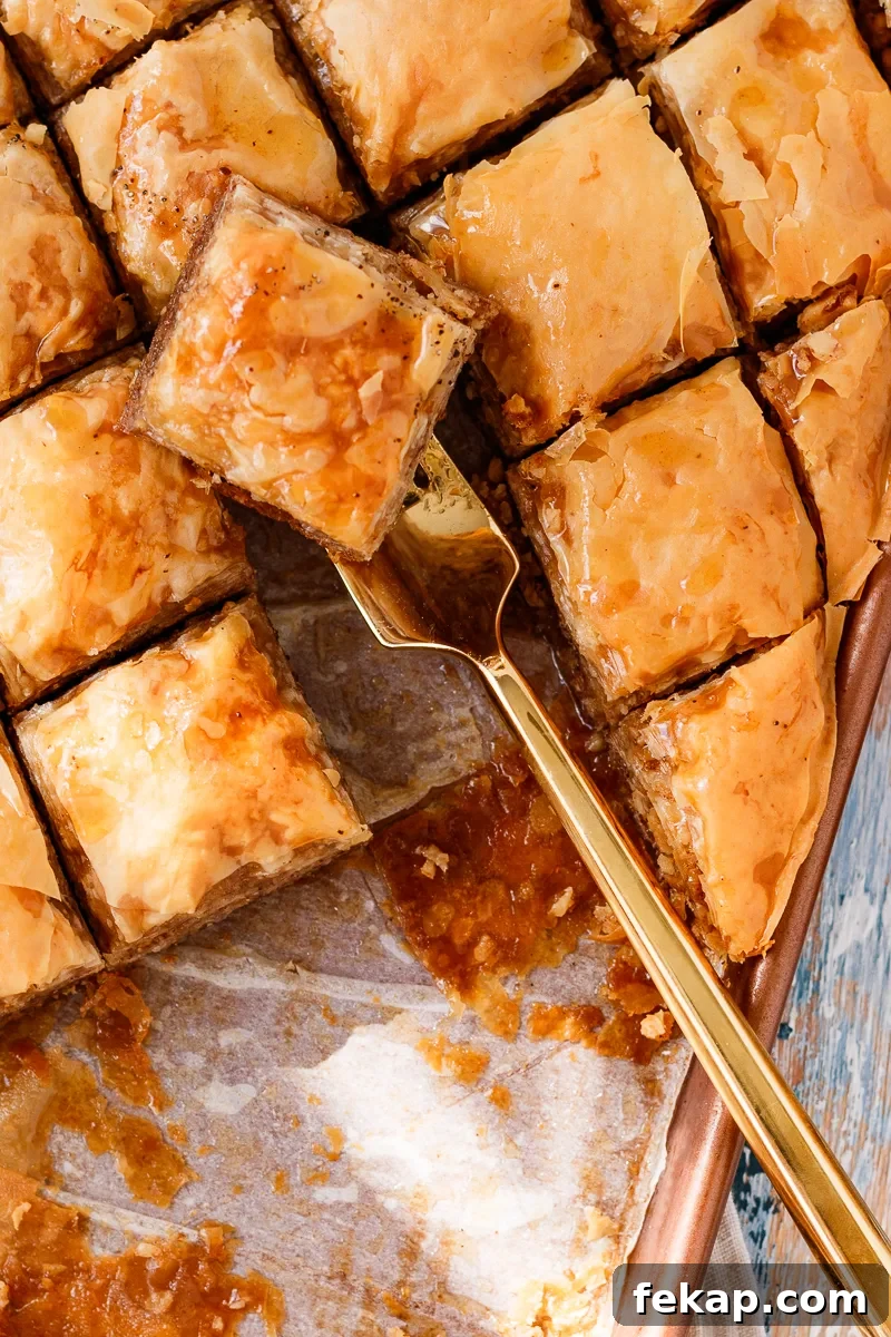Family Baklava Recipe with Flaky Phyllo and Nuts 5 top view of baklava on a sheet pan