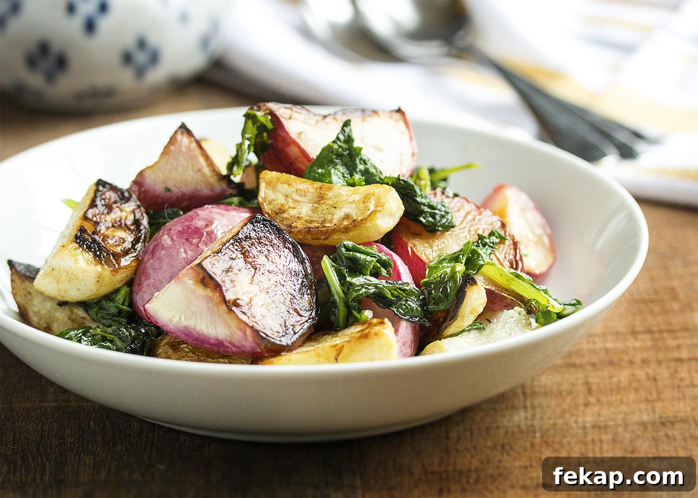 Roasted Hakurei Turnips and Radishes Recipe 4 Roasted Turnips and Radishes - Sweet Hakurei turnips and young radishes are tossed with olive oil and roasted with their greens in this simple and satisfying side dish.