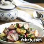 Roasted Turnips and Radishes - Sweet Hakurei turnips and young radishes are tossed with olive oil and roasted with their greens in this simple and satisfying side dish.