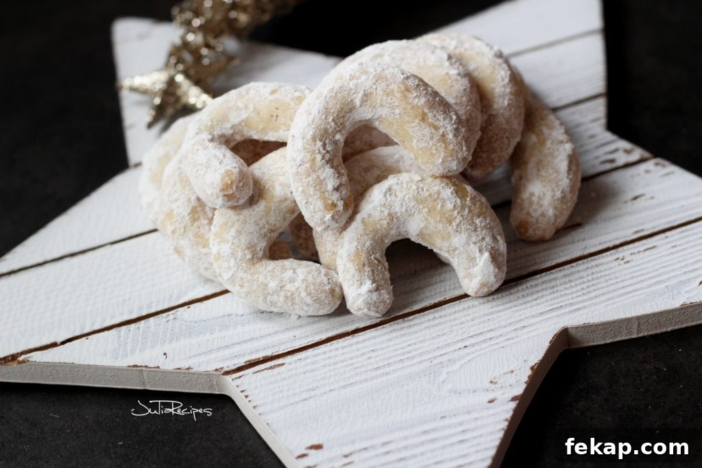 Vanilla Hazelnut Crescent Cookies 6 close up of holiday cookies in shape of a horn