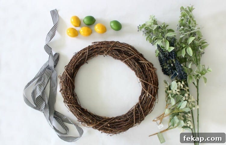 Bright pops of citrus, greenery and gingham combine for an adorable & easy citrus wreath to make this summer! easy citrus wreath supplies