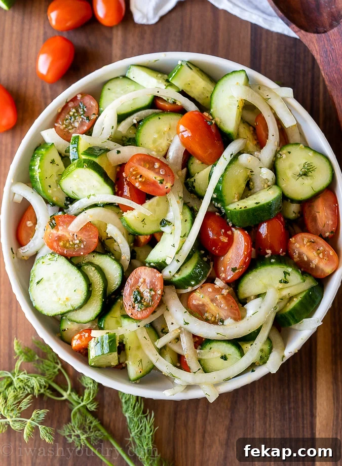 Cucumber Tomato Salad Recipe with Feta and Fresh Herbs 4 Delicious bowl filled with cucumber tomato onion salad