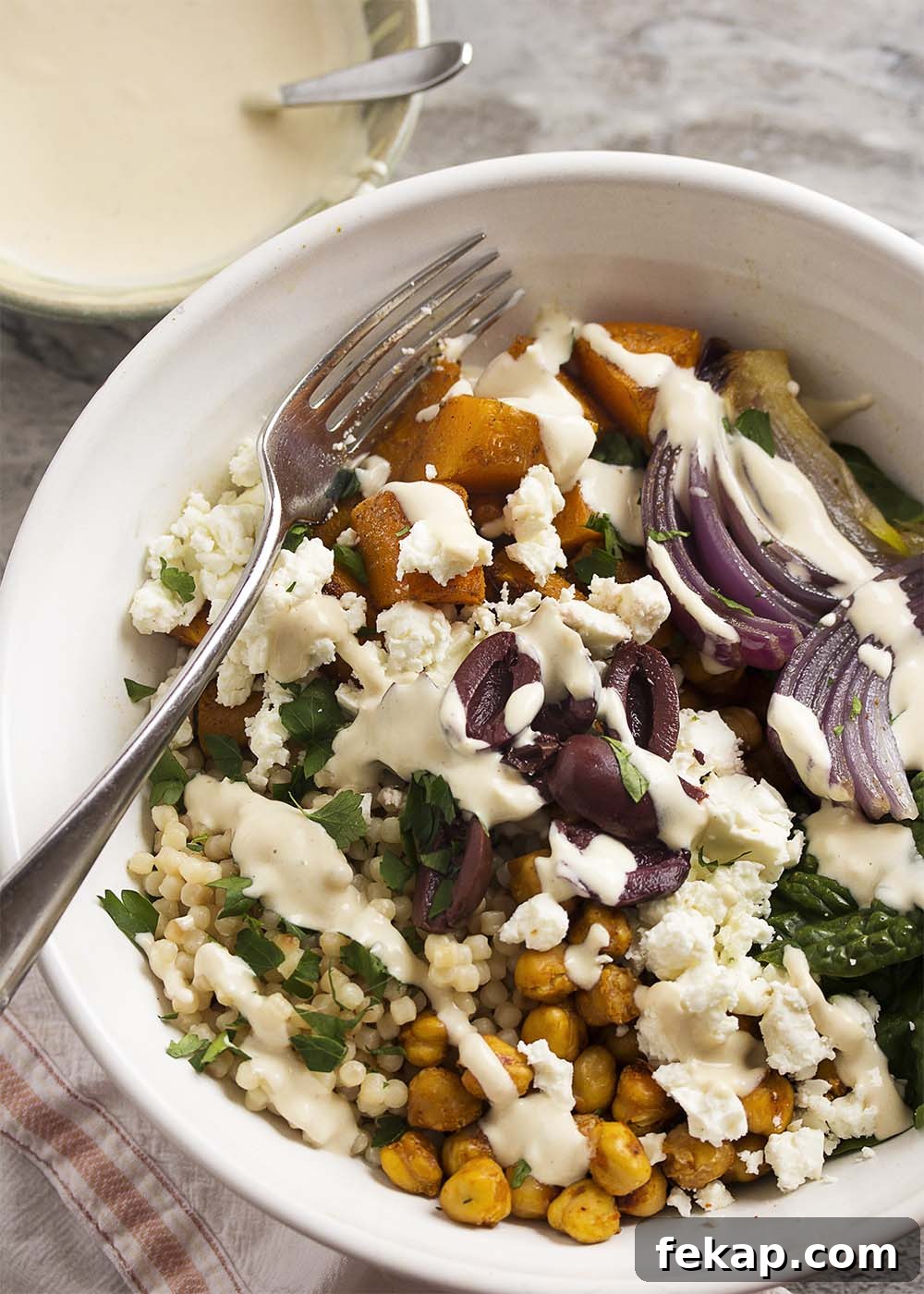 Greek buddha bowl with chickpeas and roasted squash