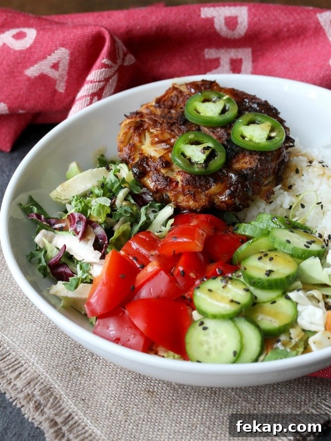 Crab cake bowl with greens and grains