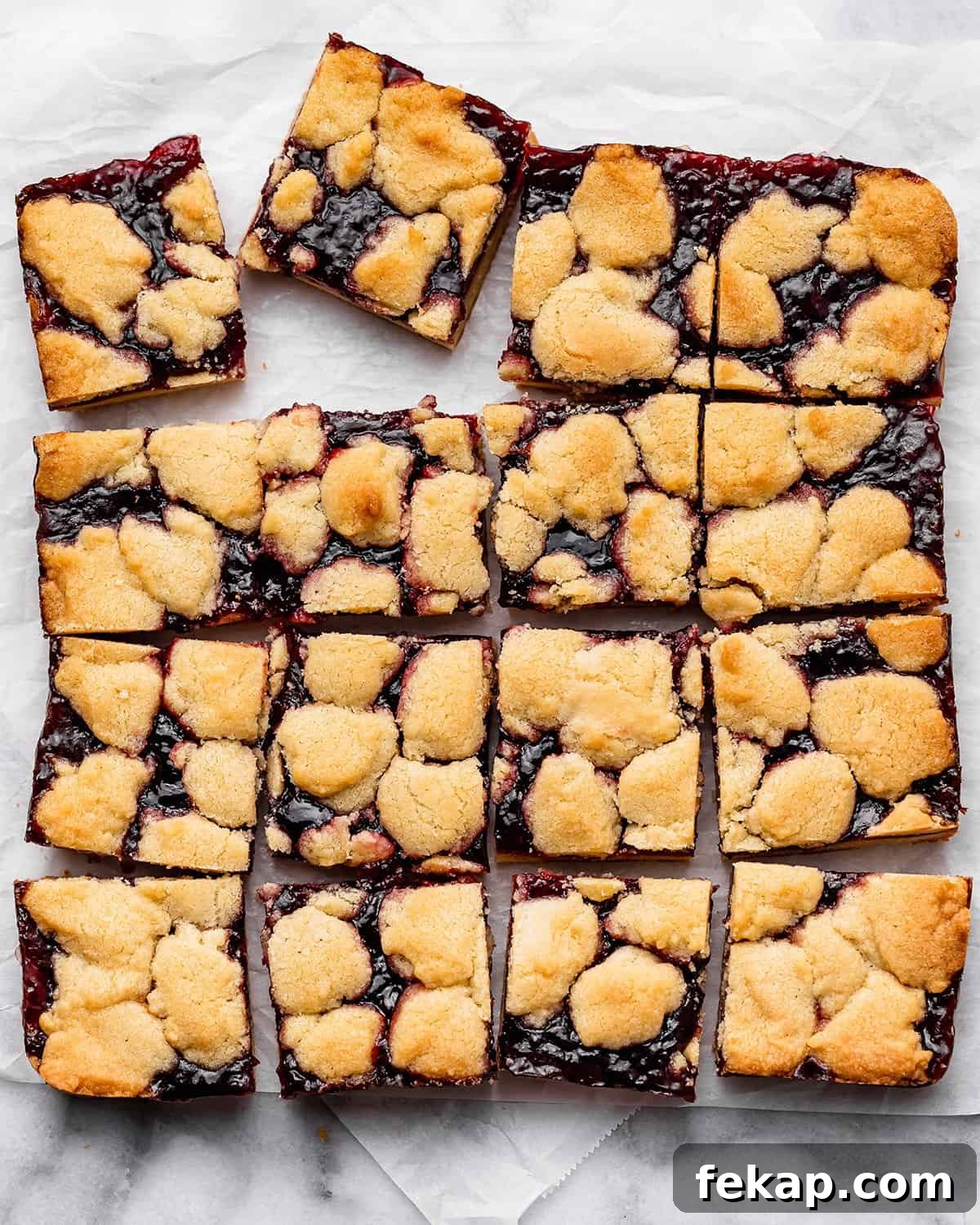 Homemade Raspberry Crumb Bars with Oat Streusel 11 16 How to Make Raspberry Crumble Bars cut into squares