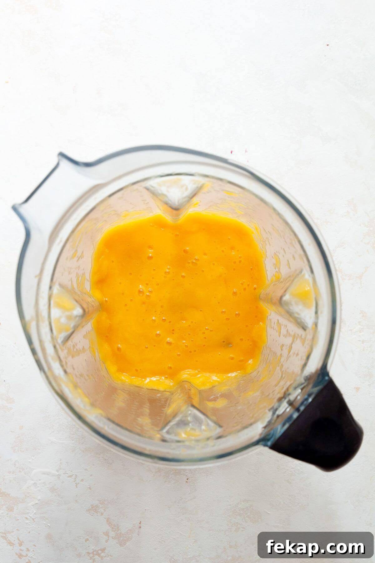 How to Make a Spicy Mango Margarita 7 Creamy, smooth spicy mango margarita in a blender.