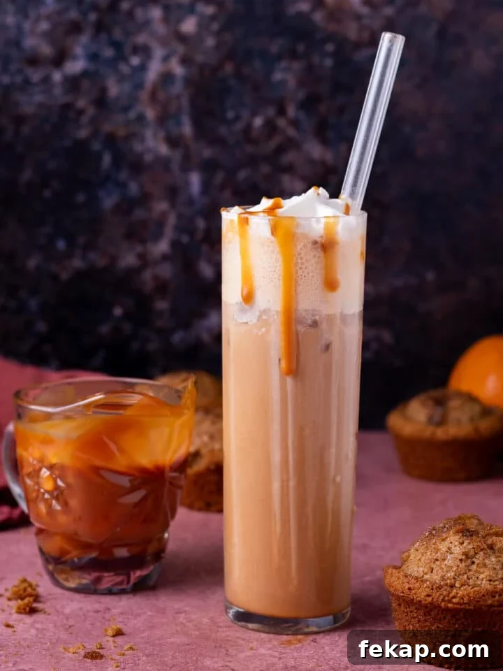 Homemade Salted Caramel Syrup Recipe for Coffee and Desserts 11 tall glass with iced salted caramel latte, small pitcher of salted caramel syrup and pumpkin muffins