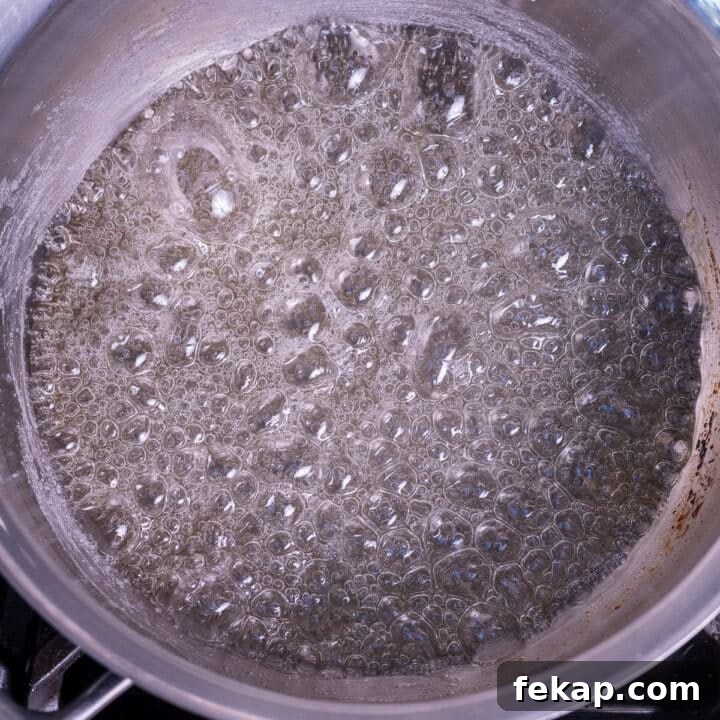Homemade Salted Caramel Syrup Recipe for Coffee and Desserts 4 boiling sugar in a saucepan