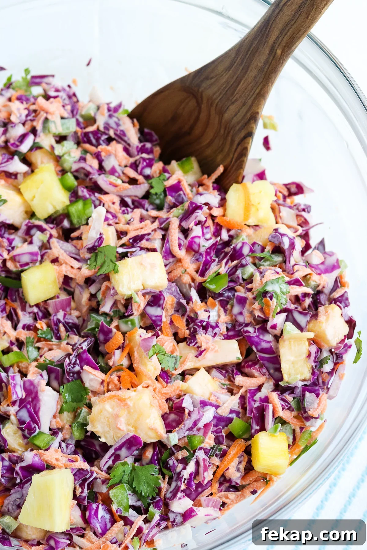 colorful coleslaw in glass bowl.