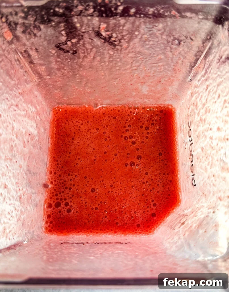 How to Make a Hennessy Margarita Cocktail 7 pureed strawberries in a blender