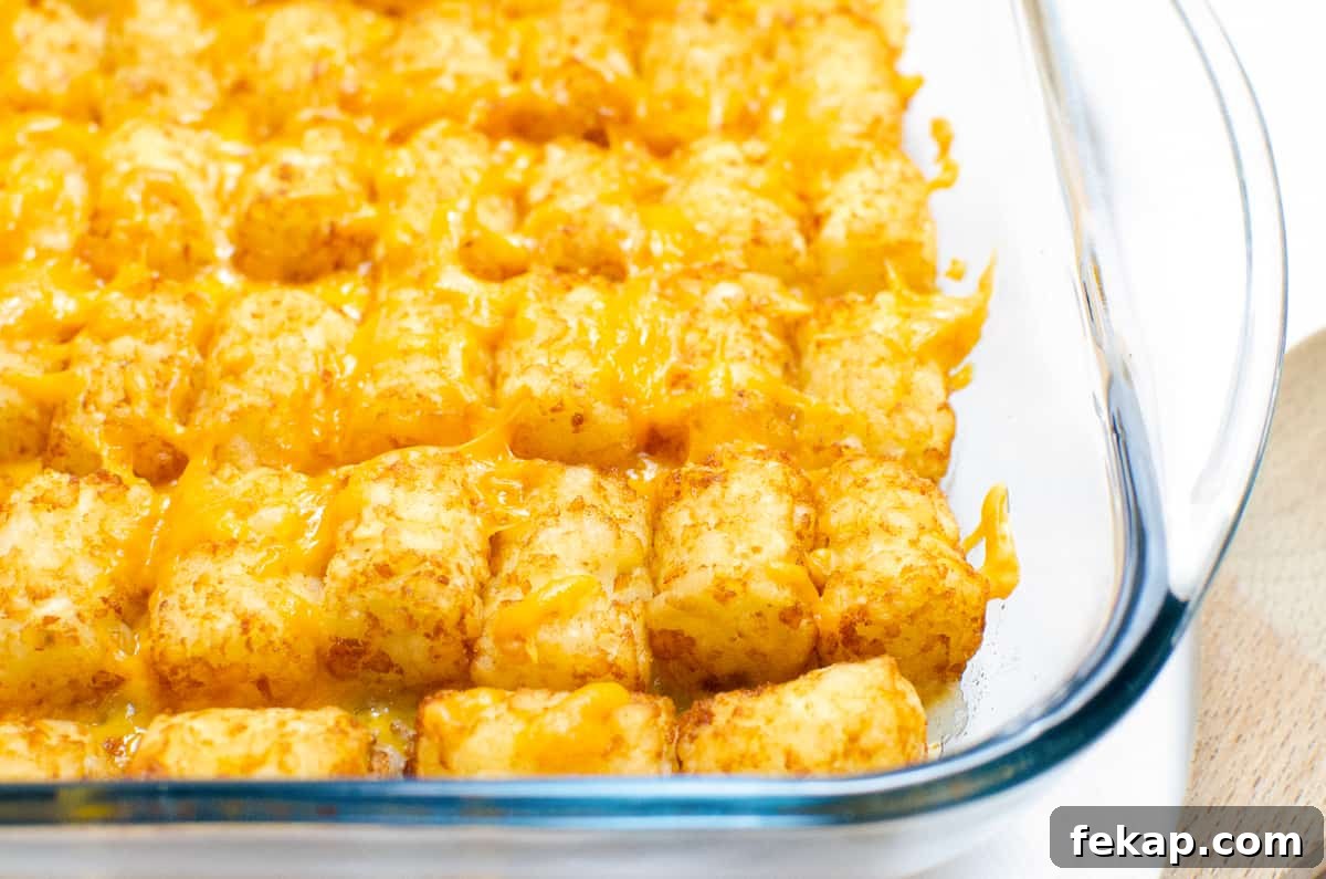 Cheesy tater tot casserole in casserole dish