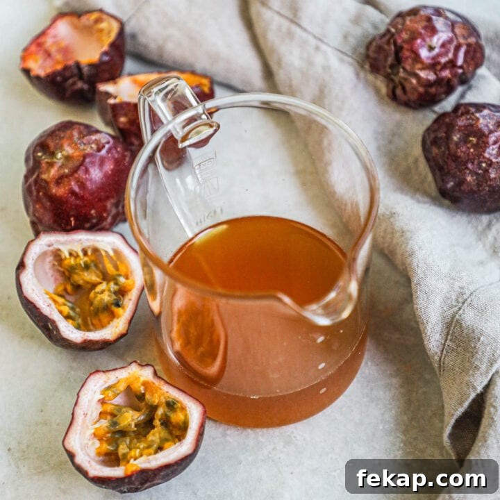 Passion fruit (lilikoi) honey syrup in a small carafe for serving.