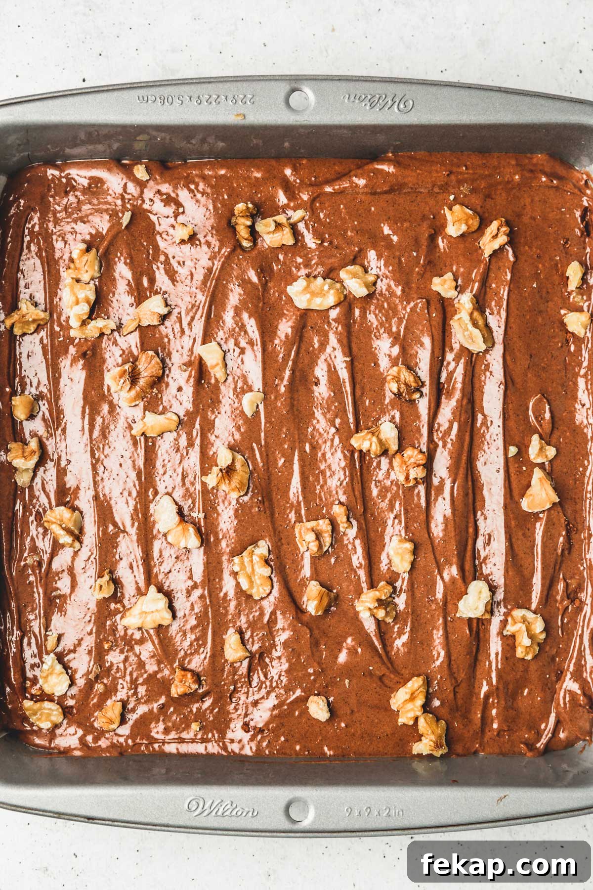 Fudgy Walnut Brownies Recipe 8 brownie batter in a pan