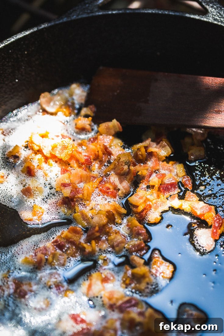 Authentic German Potato Salad with Bacon and Vinegar 3 bacon in skillet for german potato salad