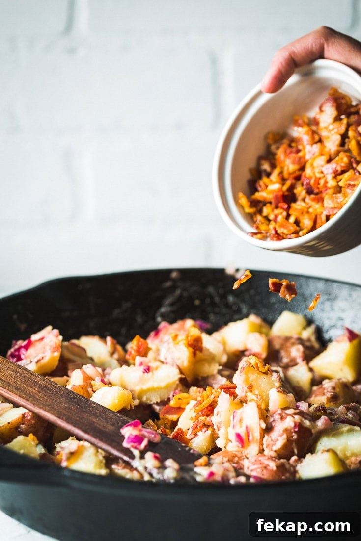 Authentic German Potato Salad with Bacon and Vinegar 4 adding bacon to german potato salad