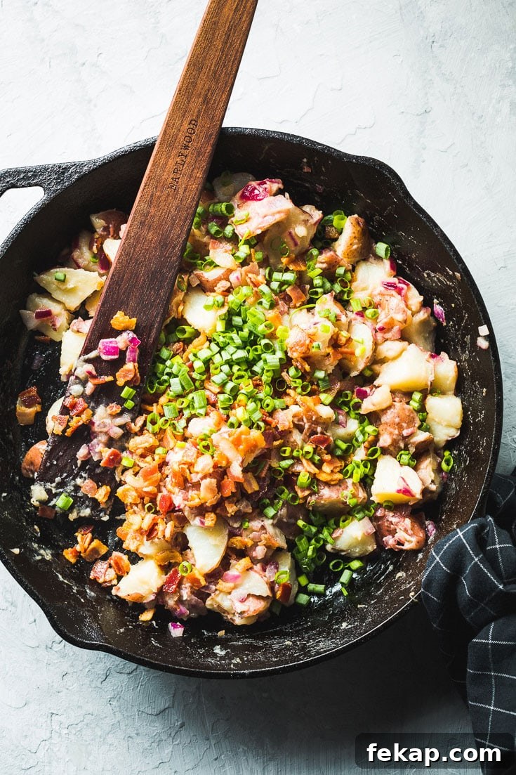 Authentic German Potato Salad with Bacon and Vinegar 5 german potato salad in skillet