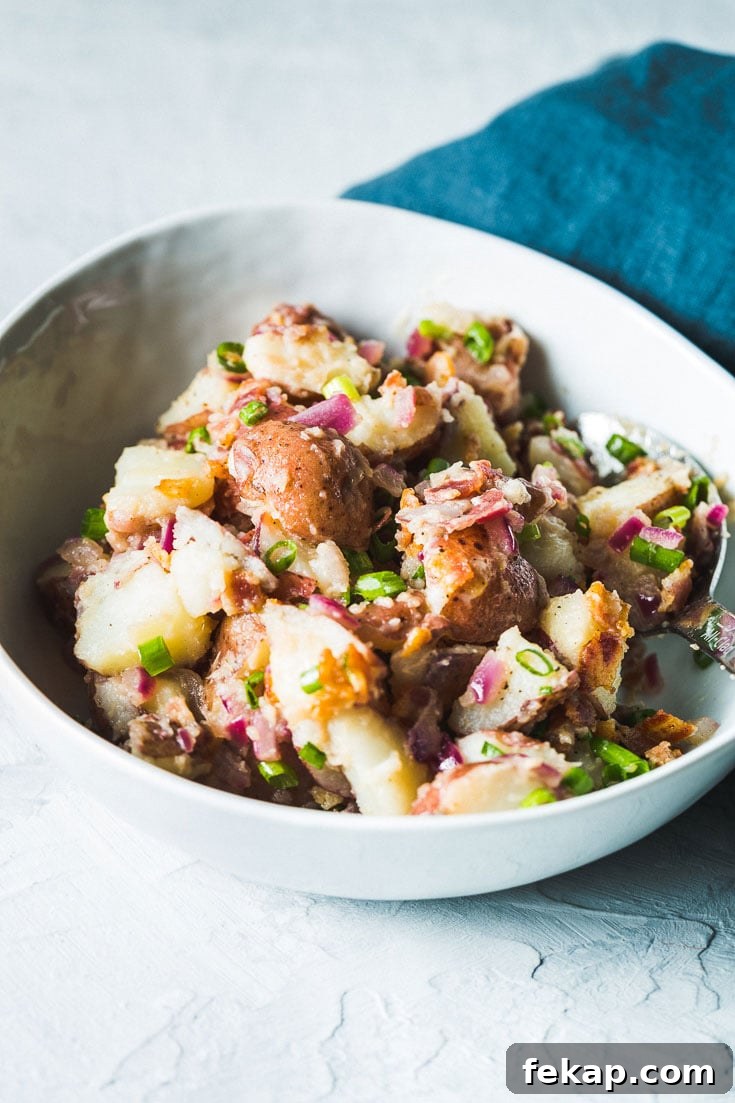 Authentic German Potato Salad with Bacon and Vinegar 6 german potato salad in bowl from side