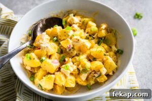 Authentic German Potato Salad with Bacon and Vinegar 7 american potato salad 3-4 view horizontal